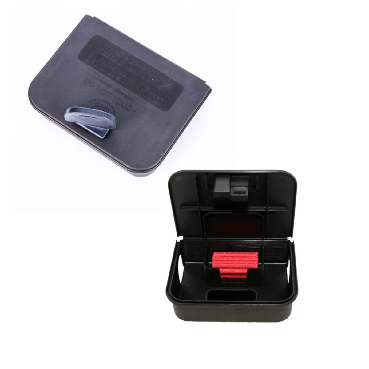 Black plastic container with red component and gray lid on a white background, bait station